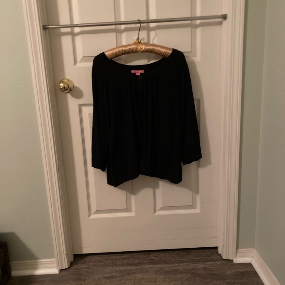 Ladies cardigan, very full so covers a lot